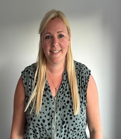 Sarah A lady posing for the camera, an owner of ATTC Education.